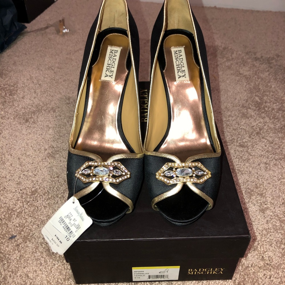 Black and gold peep toe heels